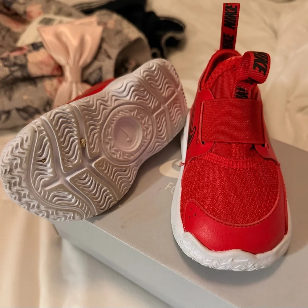 Nike Red Kids Slip-On Sneakers with Black Swoosh